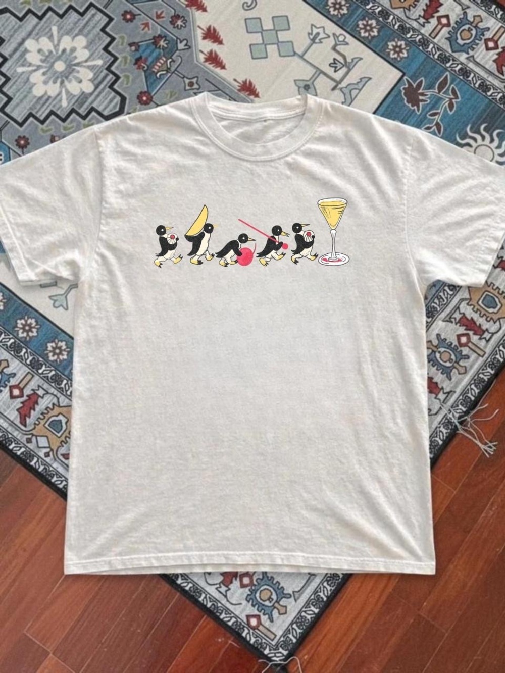 Gildan White Short-Sleeve Tee with Playful Penguin Sequence Graphic